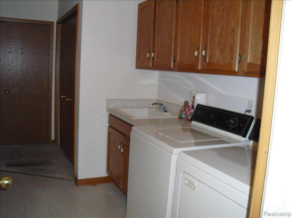 3368 Rivers Edge Drive, Unit 7 Wayne, MI 48184 - Photo 9 of 12 LAUNDRY ROOM