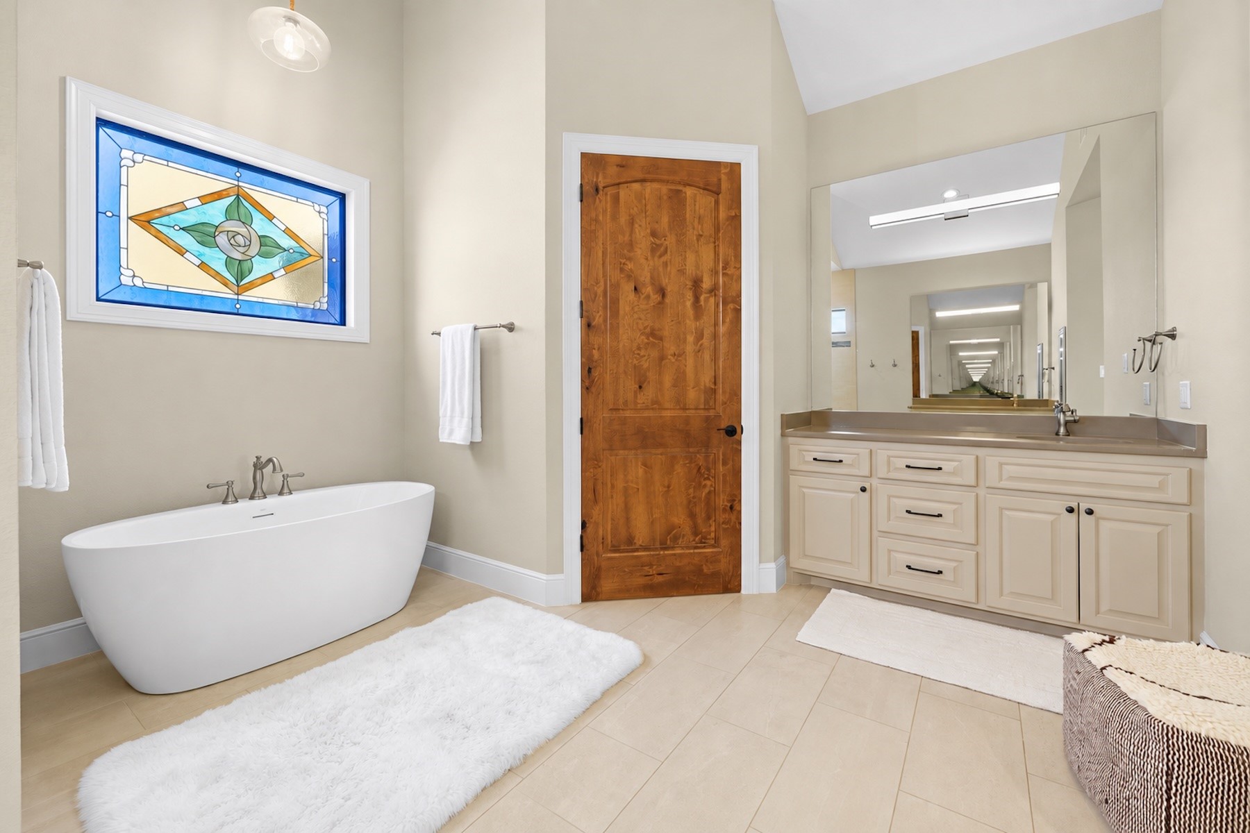 30163 High Spirit Ranch Road Hempstead, TX 77445 - Photo 23 of 46 The spacious primary bath features a standalone tub.