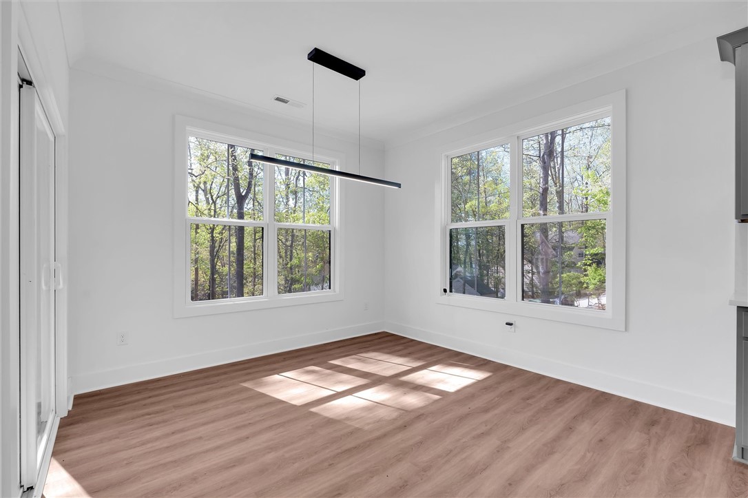 407 Blue Ridge Court Westminster, SC 29693 - Photo 15 of 48 This airy room features ample natural light, creating a serene and inviting atmosphere.