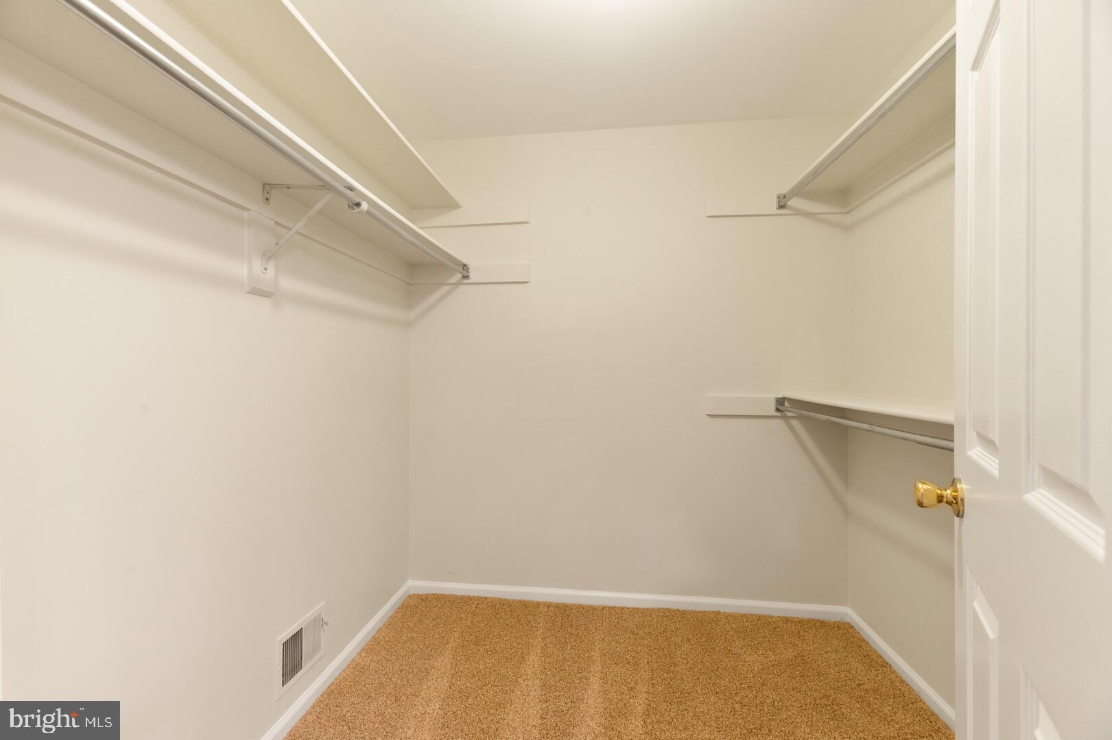 157 Peyton Road Sterling, VA 20165 - Photo 18 of 46 Primary bedroom walk in closet