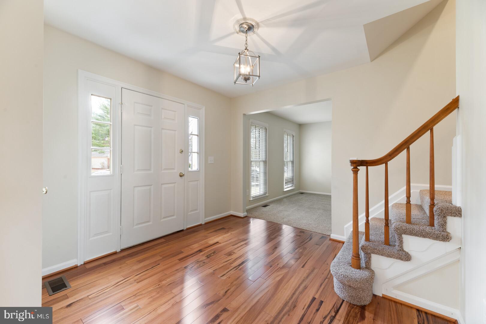 157 Peyton Road Sterling, VA 20165 - Photo 3 of 46 Bright and open entry with hardwood floors