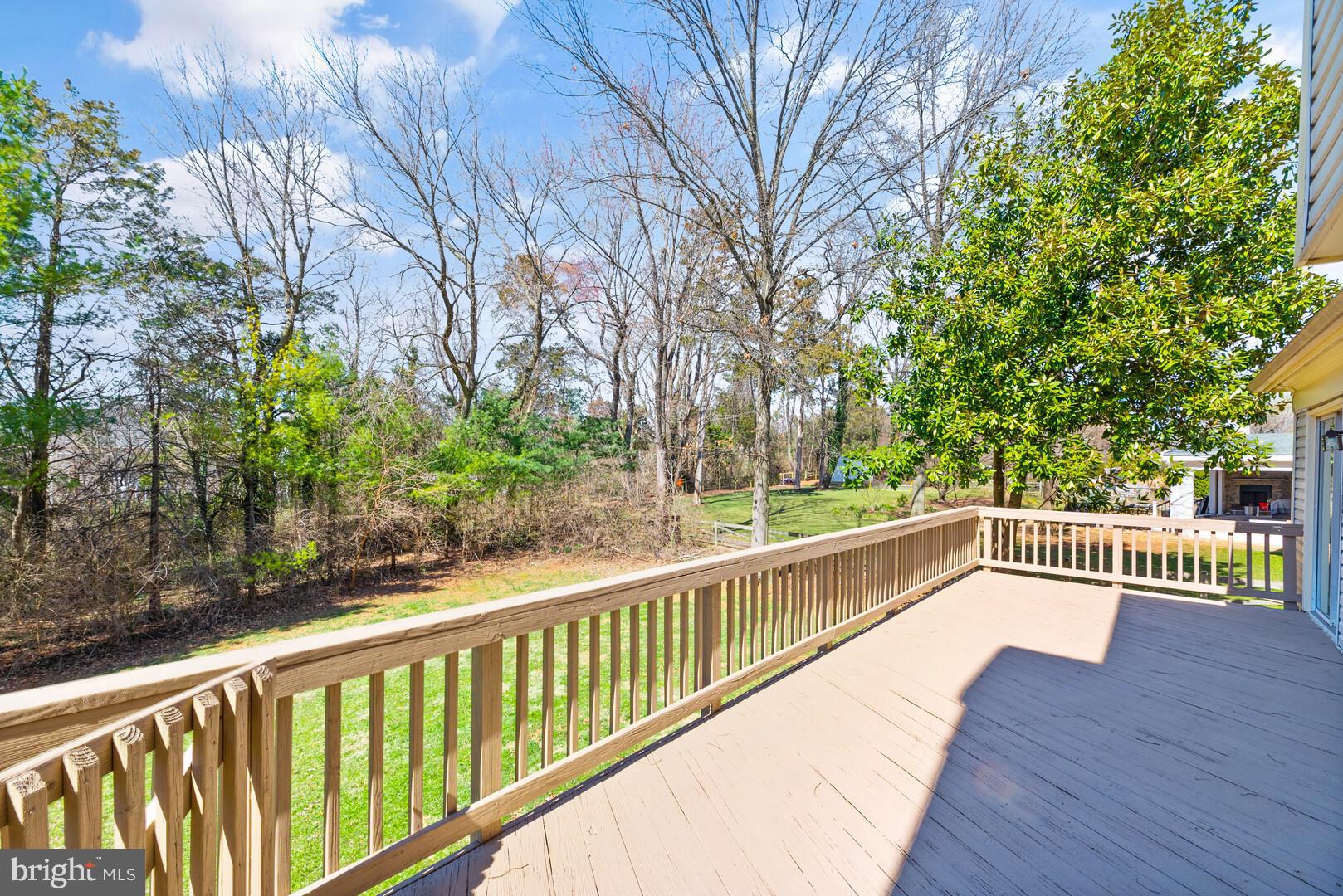 157 Peyton Road Sterling, VA 20165 - Photo 38 of 46 Large deck overlooking a flat backyard