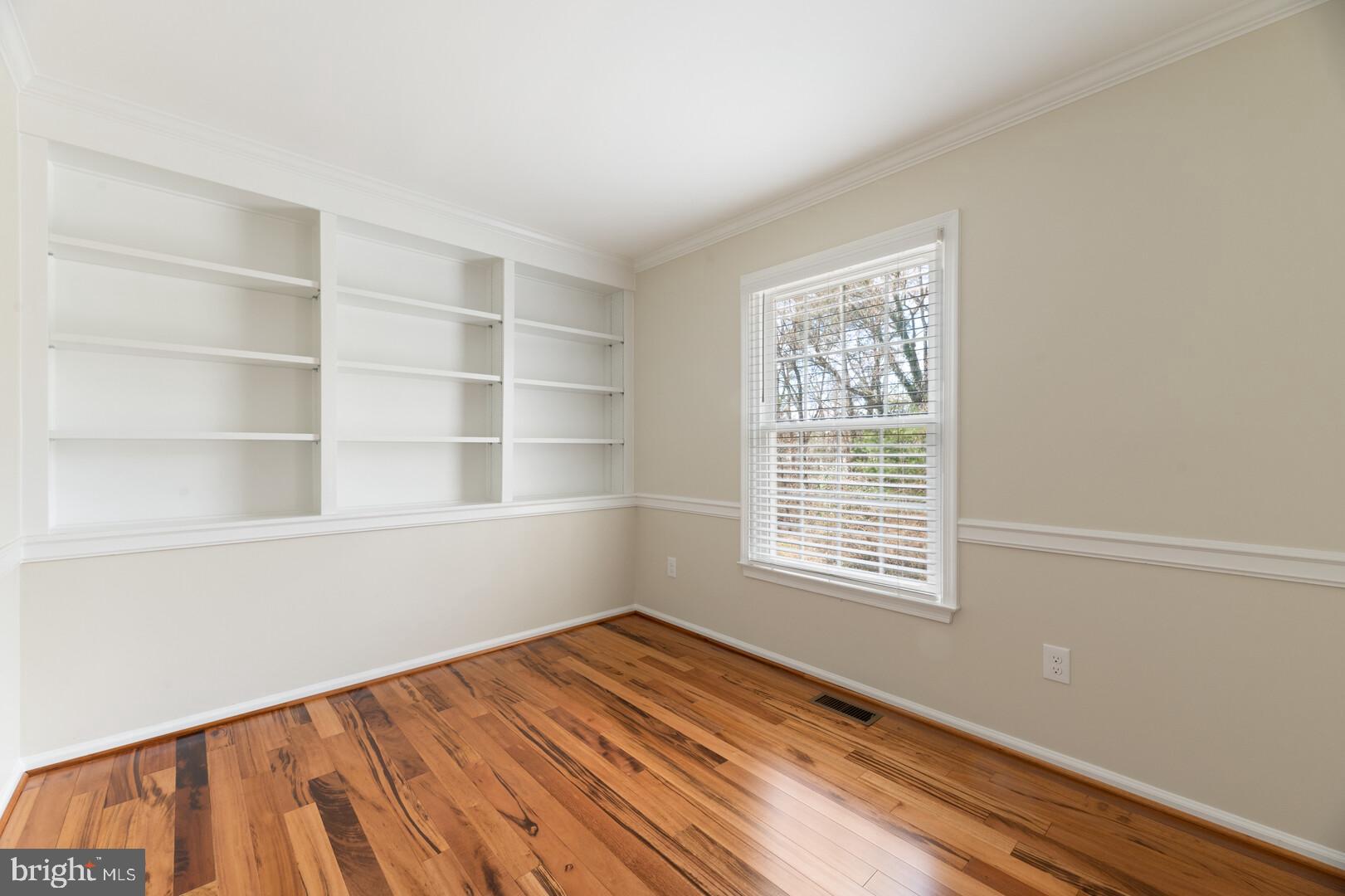 157 Peyton Road Sterling, VA 20165 - Photo 9 of 46 Home office with built-ins and view of back yard