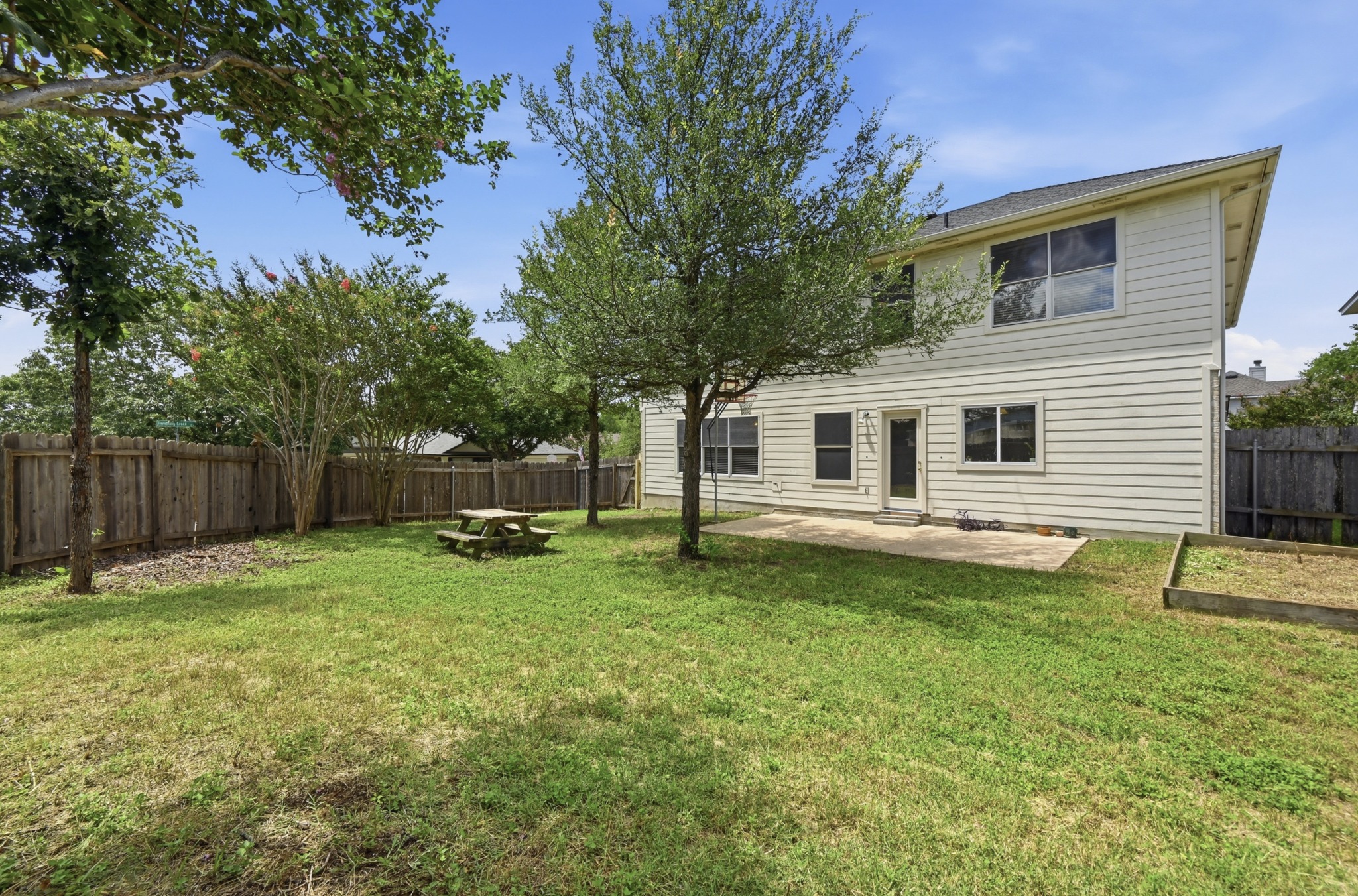 2700 Cradlerock Terrace Austin, TX 78748 - Photo 29 of 29 a view of a backyard with a car parked