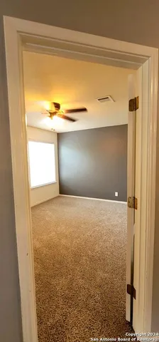 a bathroom with a bathtub and a sink