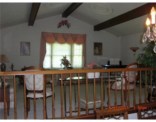 198 Paris Colliers Road Burgettstown, PA 15021 - Photo 4 of 18 Living Room. OPEN AND AIRY WITH BEAMED CATHEDRAL CEILINGS - LOOKS OVER DININGROOM