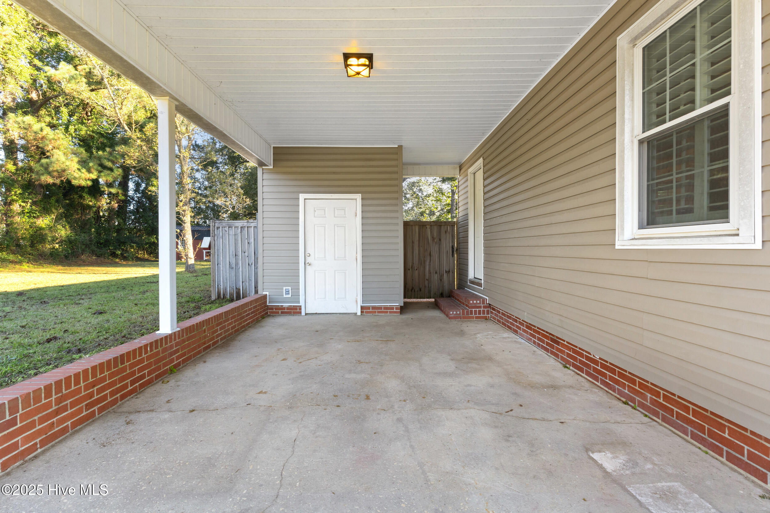 627 Ludie Brown Road Chinquapin, NC 28521 - Photo 2 of 16 carport