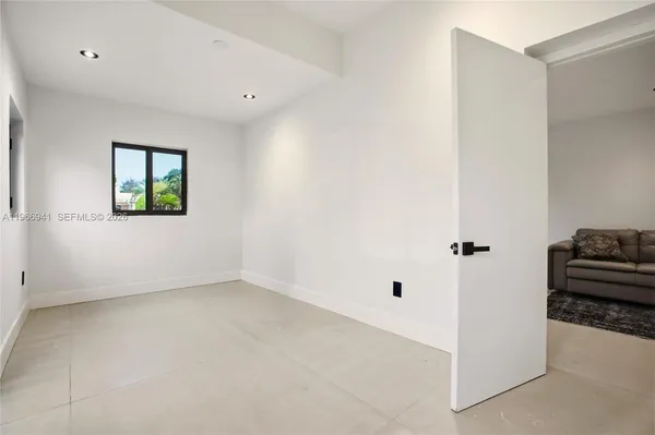 a bedroom with a bed and a closet