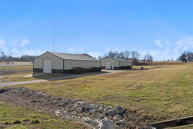 $299,000 | 27219 Highway 2, Freeman, MO 64746
