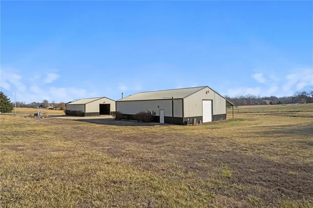 $299,000 | 27219 Highway 2, Freeman, MO 64746