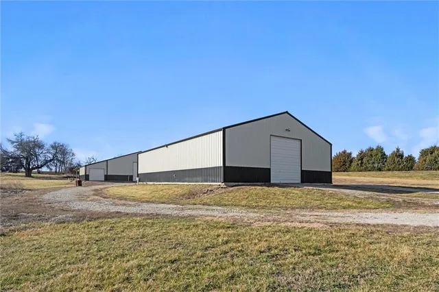 $299,000 | 27219 Highway 2, Freeman, MO 64746