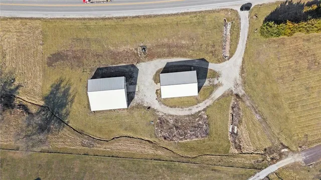 $299,000 | 27219 Highway 2, Freeman, MO 64746