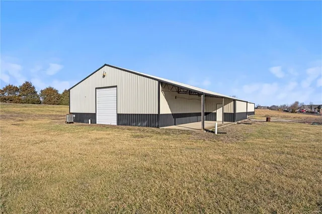 $299,000 | 27219 Highway 2, Freeman, MO 64746
