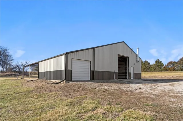 $299,000 | 27219 Highway 2, Freeman, MO 64746