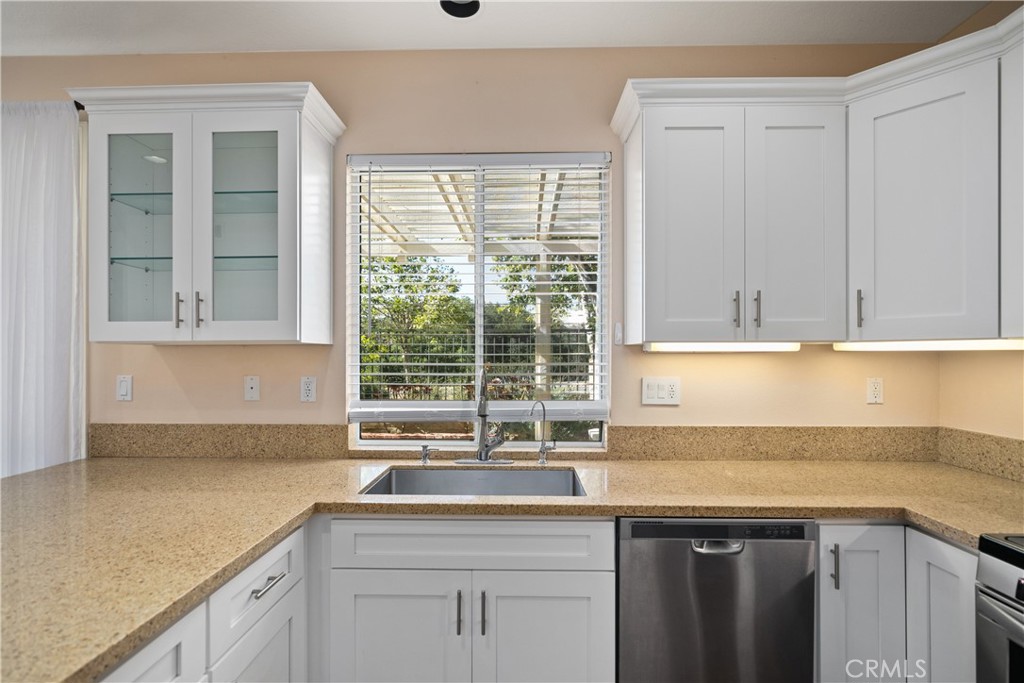 9 Acorn Ridge Rancho Santa Margarita, CA 92688 - Photo 18 of 39 The kitchen has stainless steel appliances