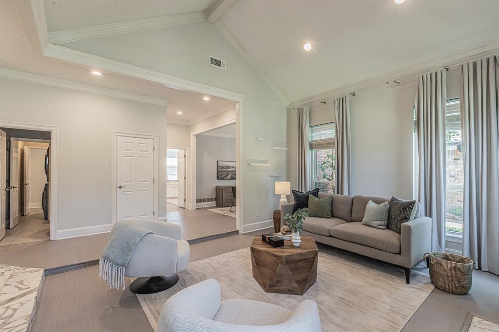 300 Sundance Circle Irving, TX 75063 - Photo 6 of 39 Vaulted ceiling with crown molding and recessed lighting
