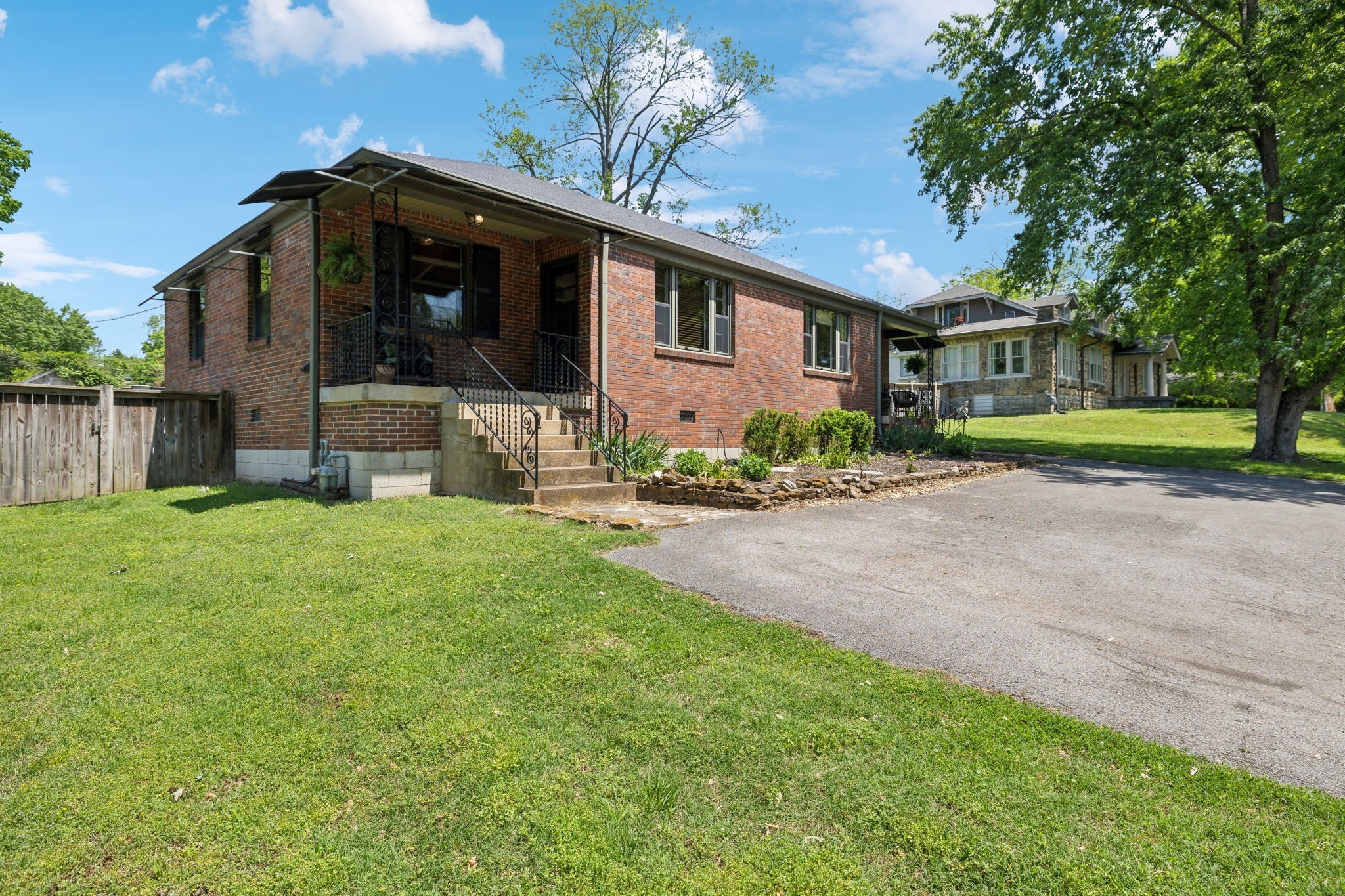 4202 Murphy Road Nashville, TN 37209 - Photo 18 of 34 a front view of house with yard and green space