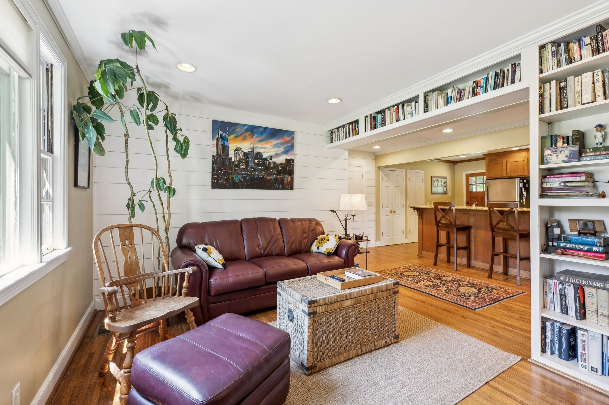 4202 Murphy Road Nashville, TN 37209 - Photo 3 of 34 a living room with furniture and a book shelf