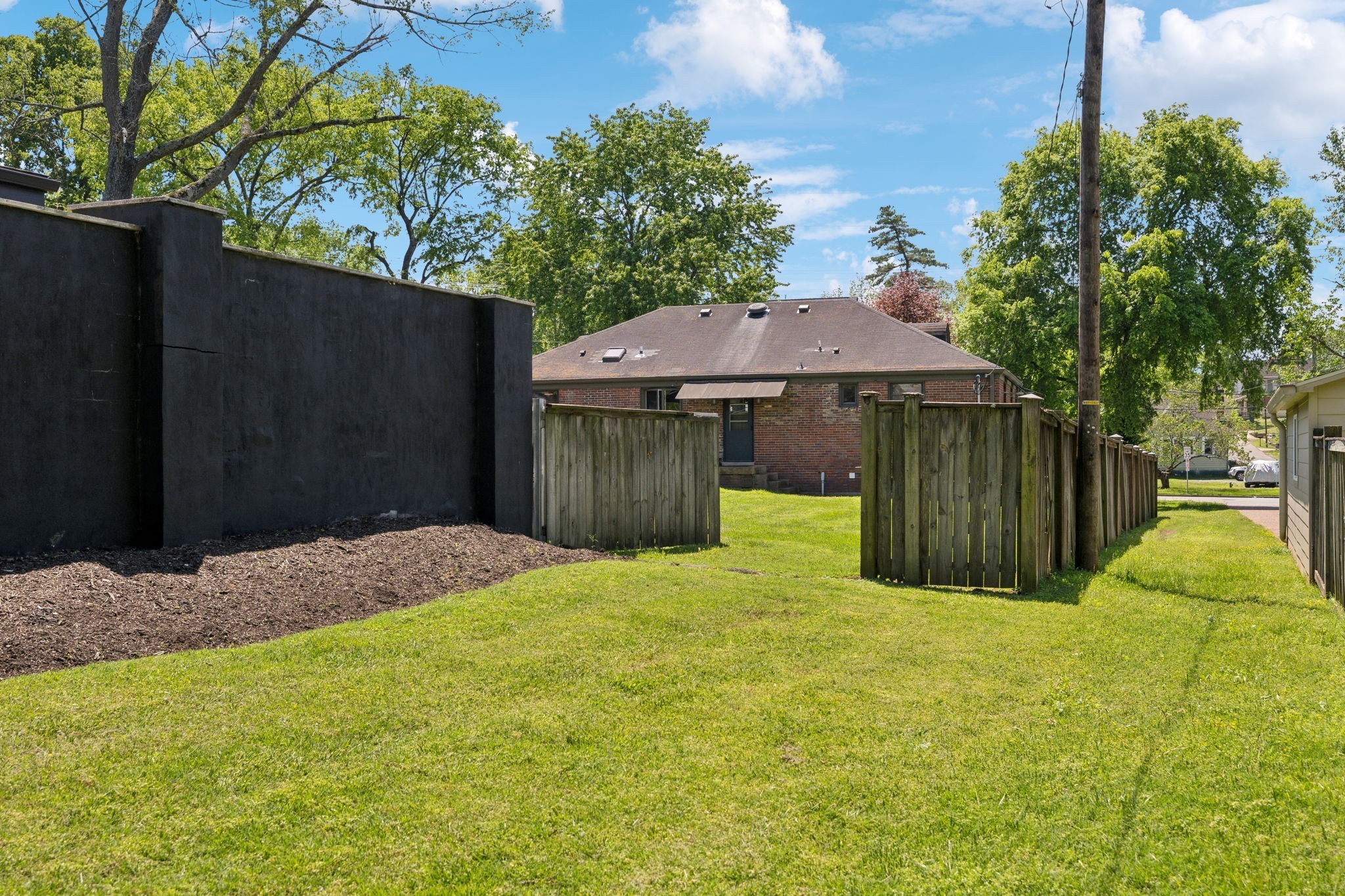4202 Murphy Road Nashville, TN 37209 - Photo 33 of 34 a house with trees in the background