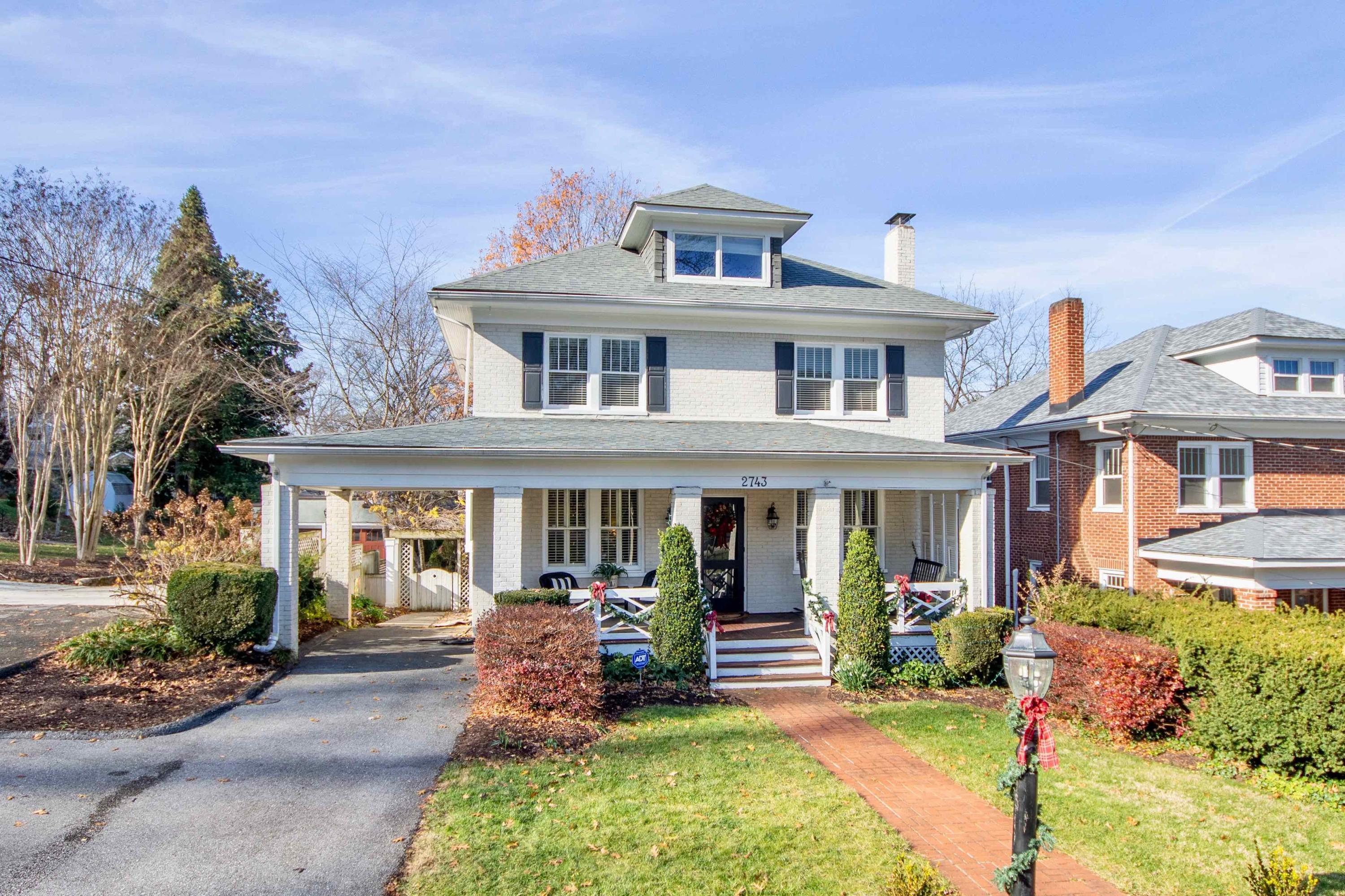 front view of a house with a yard
