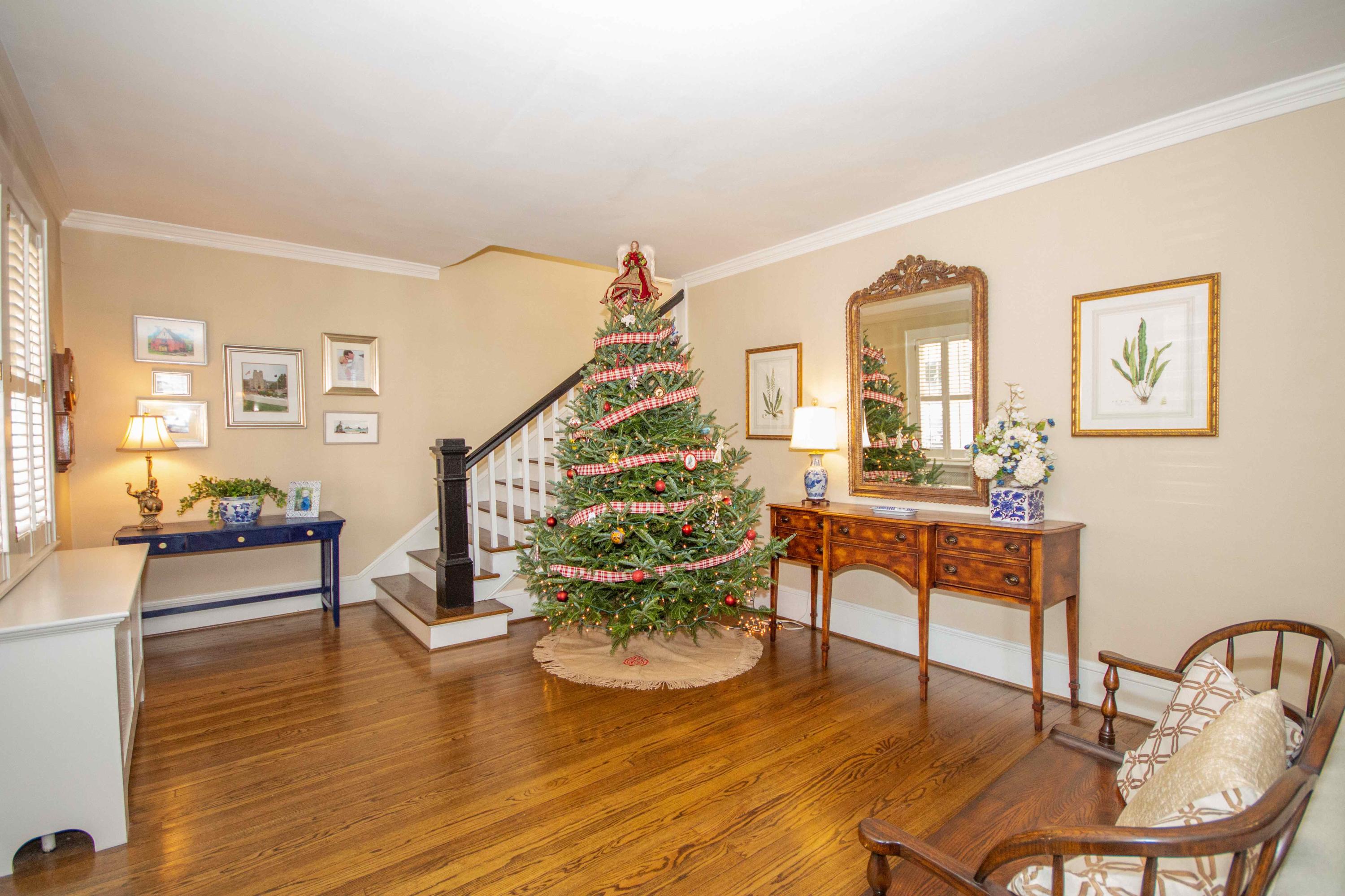 2743 Richelieu Avenue Southwest Roanoke, VA 24014 - Photo 13 of 54 a living room with furniture and a wooden floor