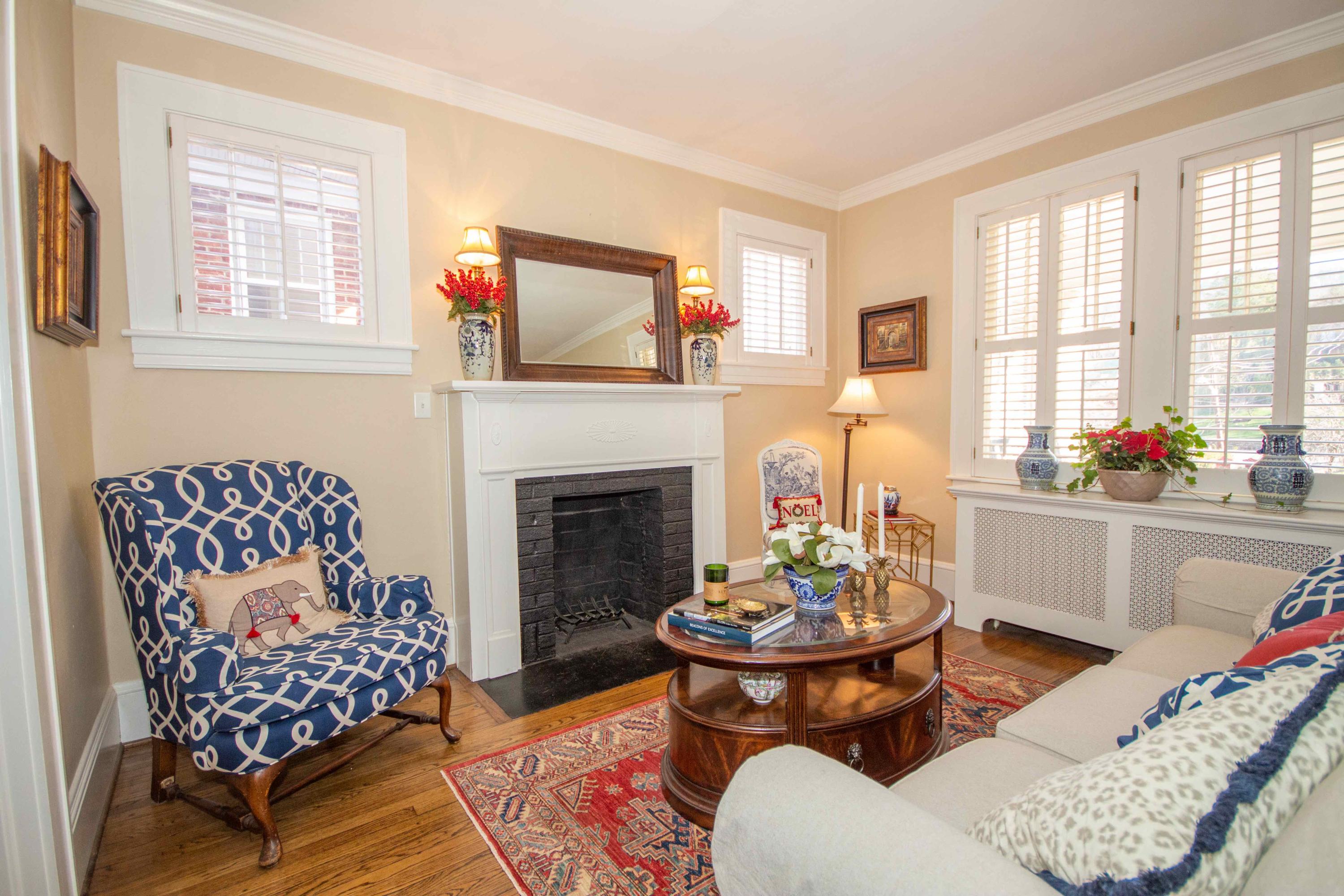 2743 Richelieu Avenue Southwest Roanoke, VA 24014 - Photo 16 of 54 a living room with furniture fireplace and window