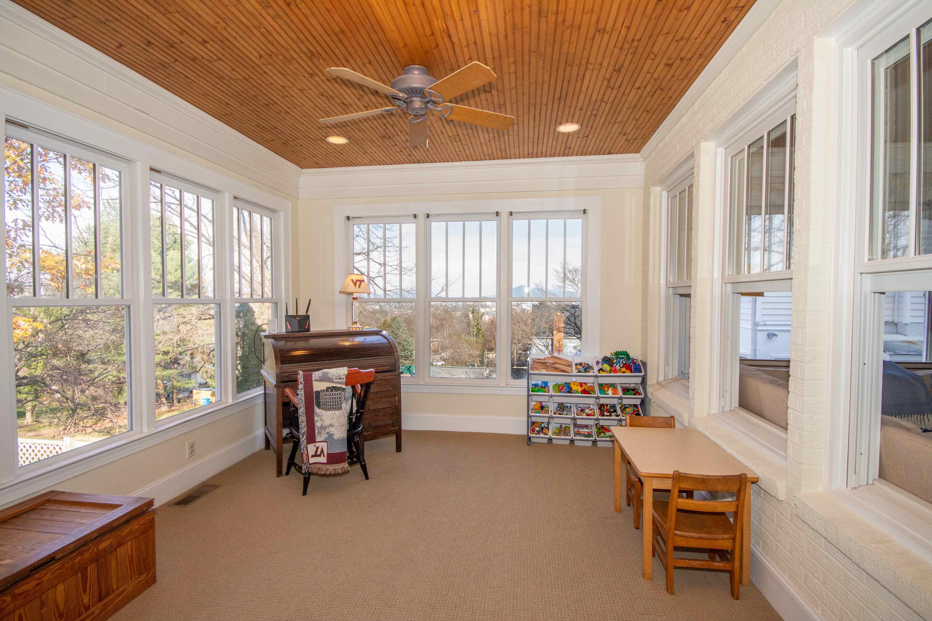 2743 Richelieu Avenue Southwest Roanoke, VA 24014 - Photo 26 of 54 a living room with furniture and a large window
