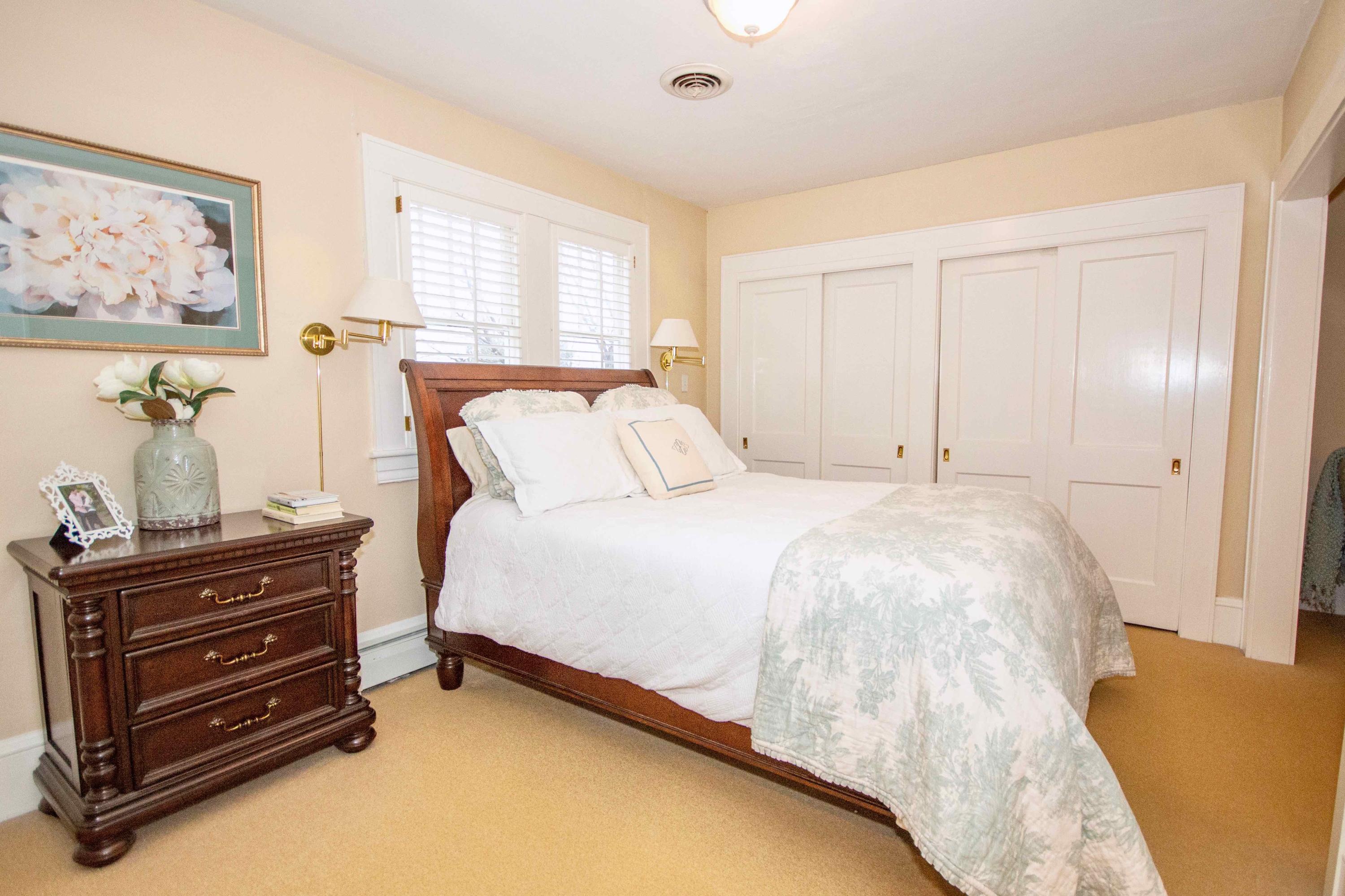 2743 Richelieu Avenue Southwest Roanoke, VA 24014 - Photo 42 of 54 a bedroom with a bed and wooden floor