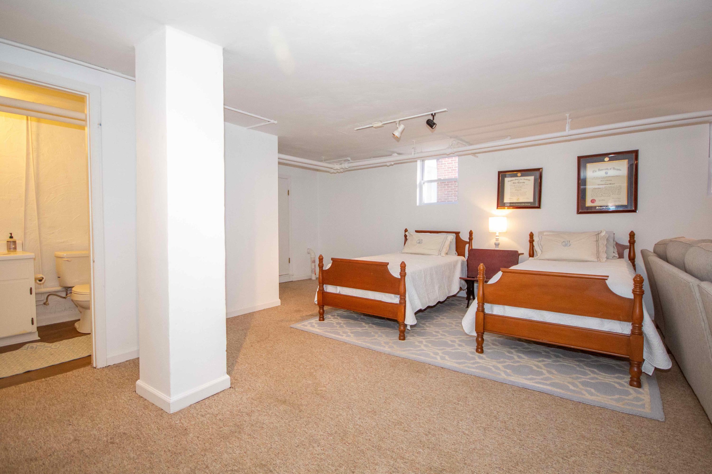 2743 Richelieu Avenue Southwest Roanoke, VA 24014 - Photo 49 of 54 a bedroom with furniture and a window