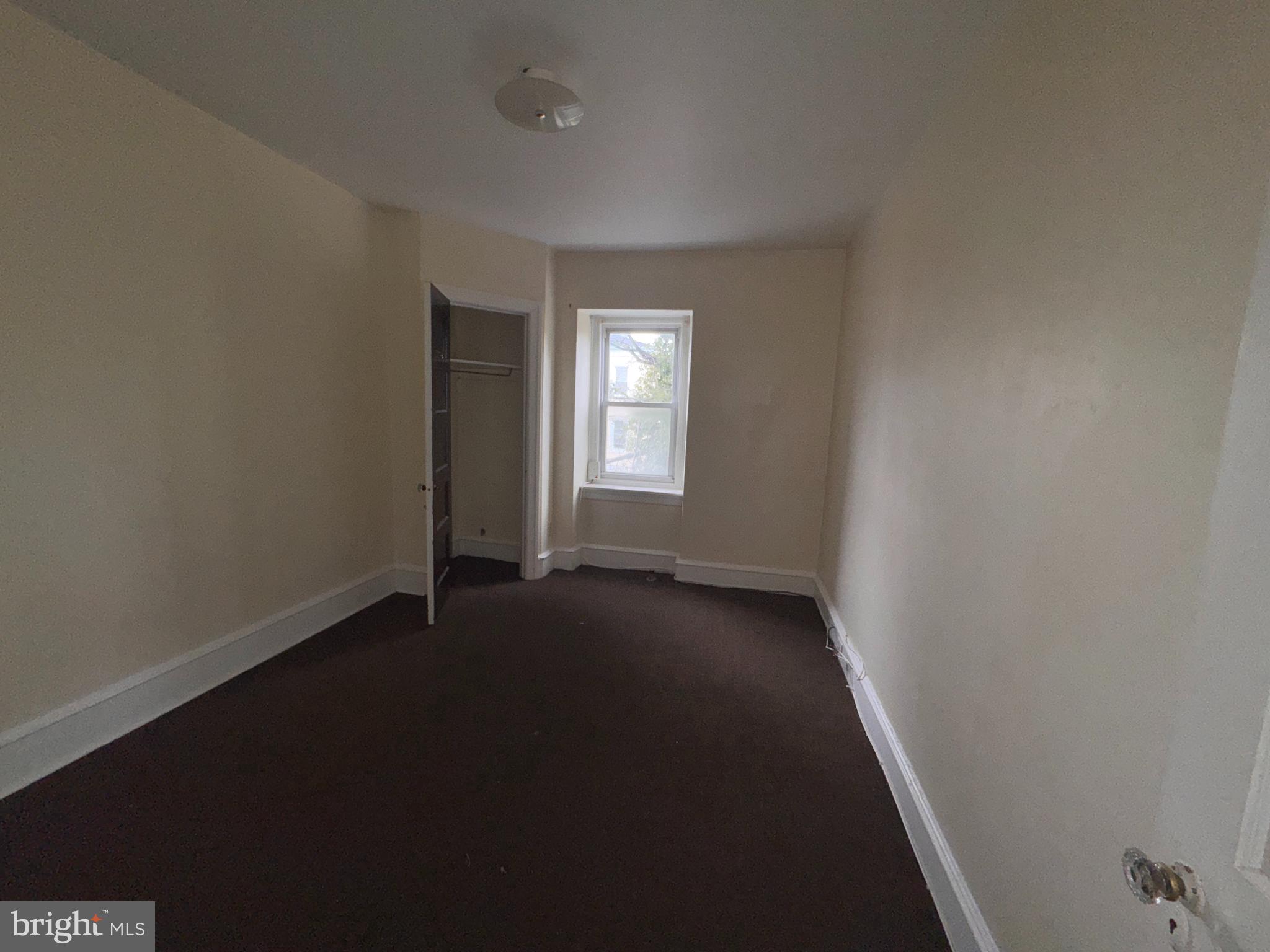 813 North 64th Street Philadelphia, PA 19151 - Photo 20 of 23 an empty room with a window