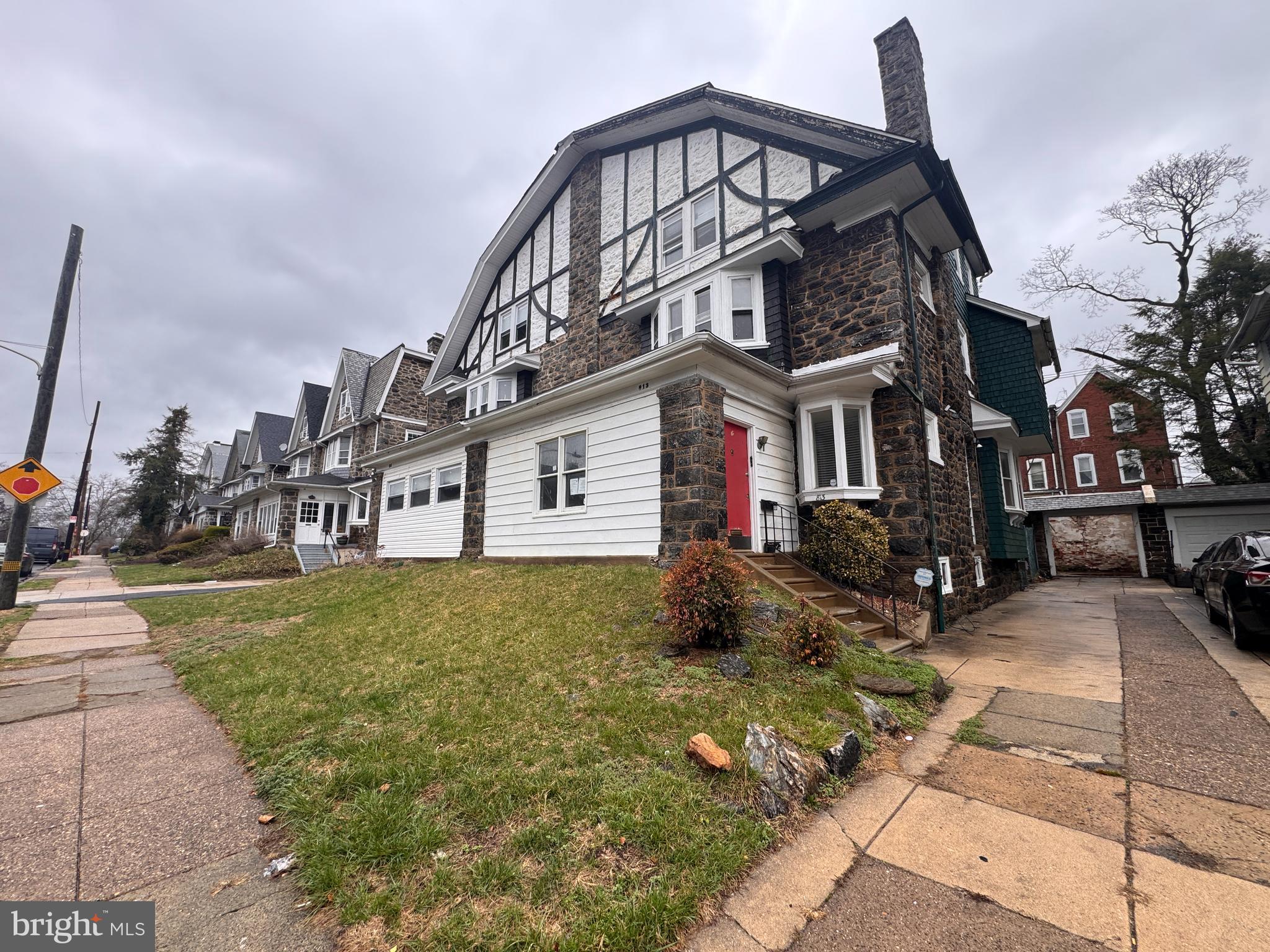 813 North 64th Street Philadelphia, PA 19151 - Photo 3 of 23 a front view of a house with garden