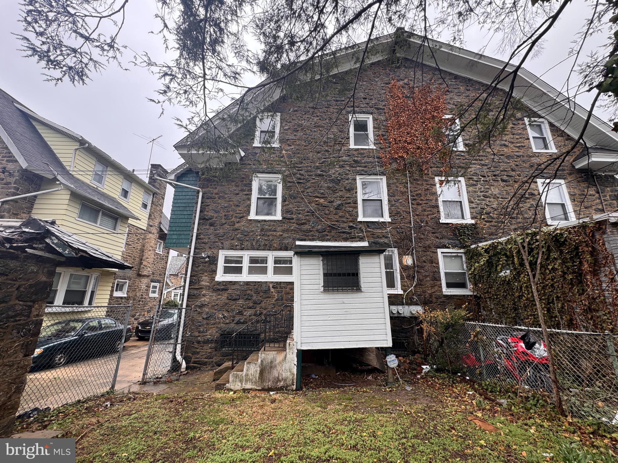 813 North 64th Street Philadelphia, PA 19151 - Photo 6 of 23 a view of a house with a yard