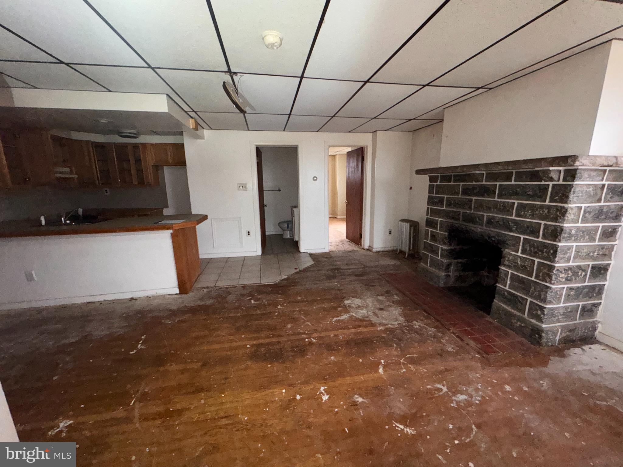 813 North 64th Street Philadelphia, PA 19151 - Photo 8 of 23 a view of an empty room with a fireplace