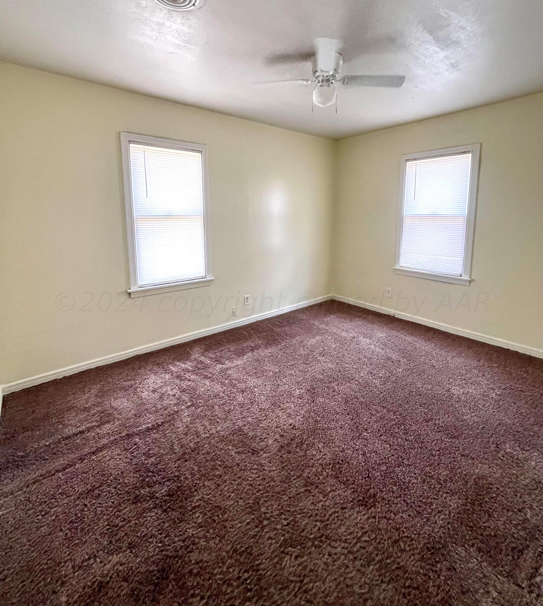 3611 South Travis Street Amarillo, TX 79110 - Photo 14 of 20 Back bedroom with fresh paint