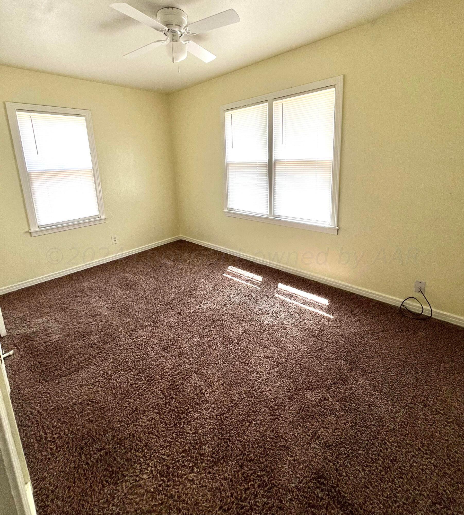 3611 South Travis Street Amarillo, TX 79110 - Photo 16 of 20 Front bedroom with fresh paint