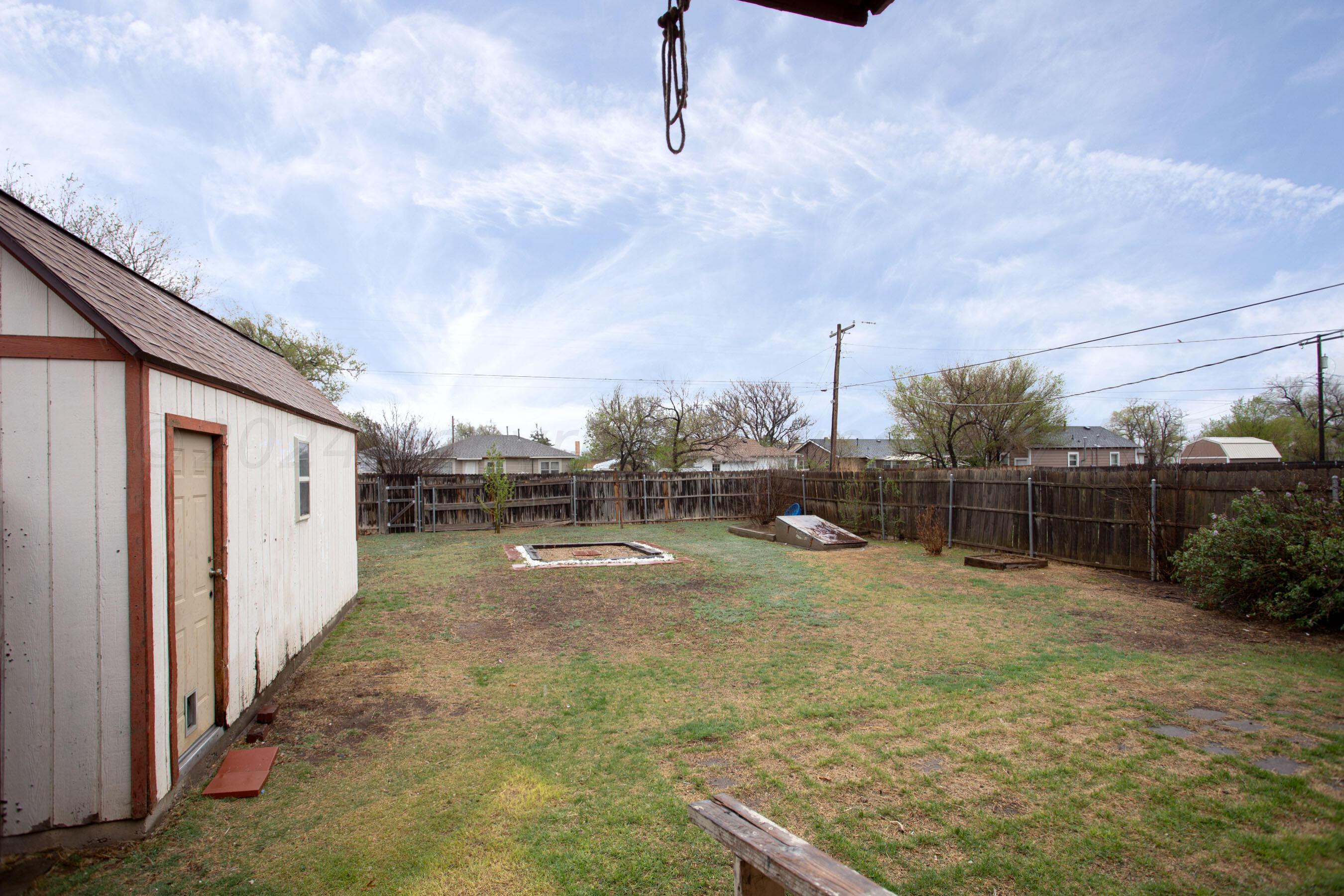 3611 South Travis Street Amarillo, TX 79110 - Photo 20 of 20 Large backyard w:storm shelter & worksho