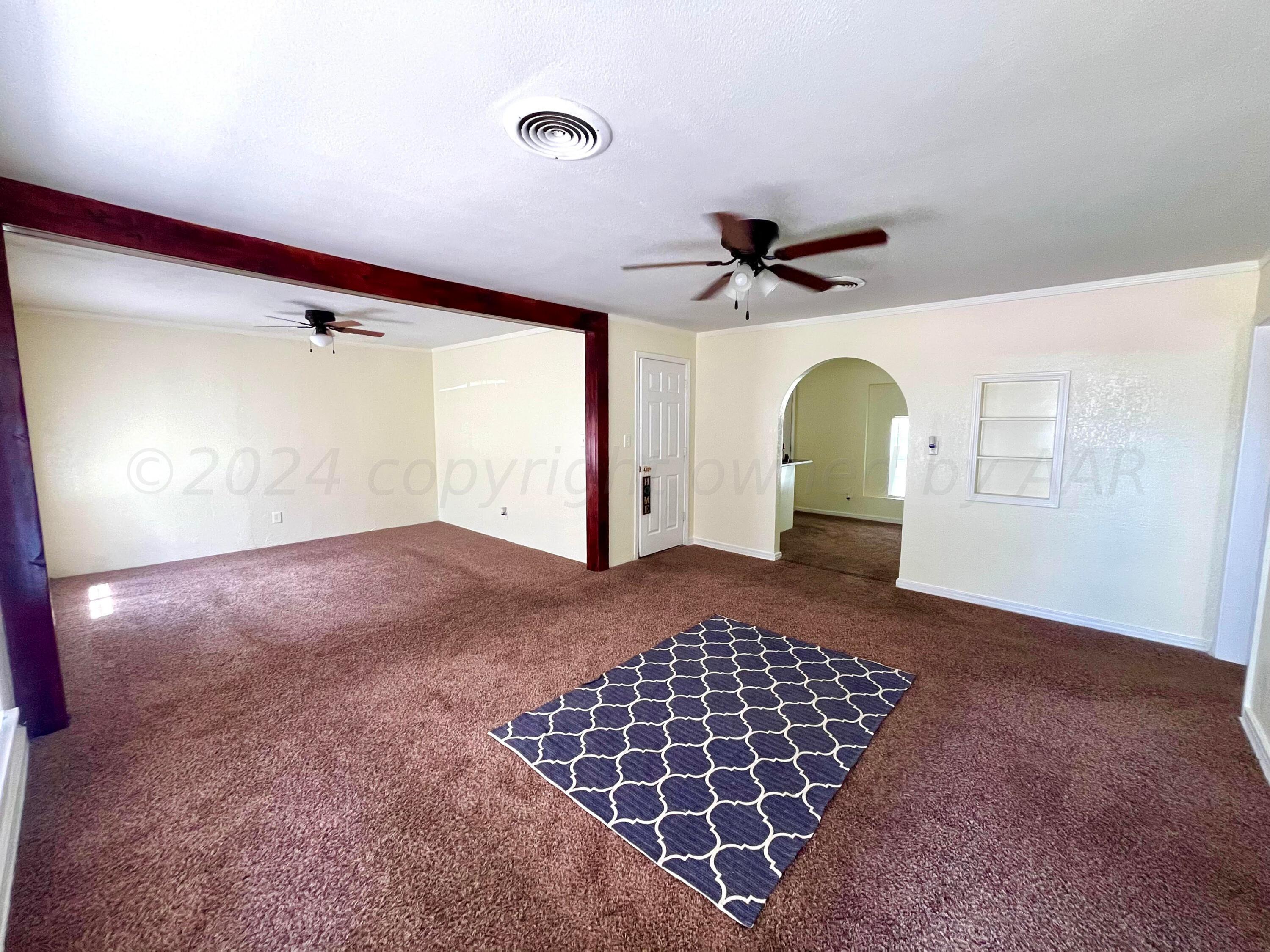 3611 South Travis Street Amarillo, TX 79110 - Photo 3 of 20 Living room to dining view