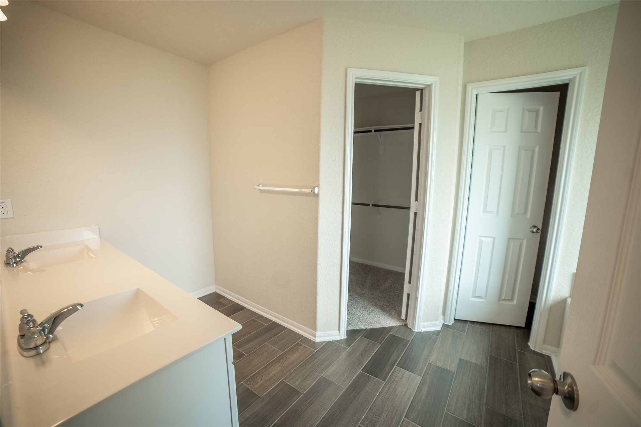 3006 Tandem Court Rosenberg, TX 77471 - Photo 14 of 33 a view of a hallway with wooden floor