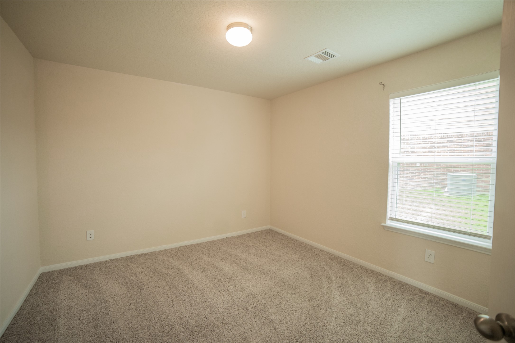3006 Tandem Court Rosenberg, TX 77471 - Photo 22 of 33 an empty room with a window