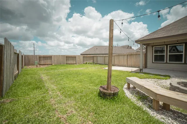 a backyard of a house with lots of green space