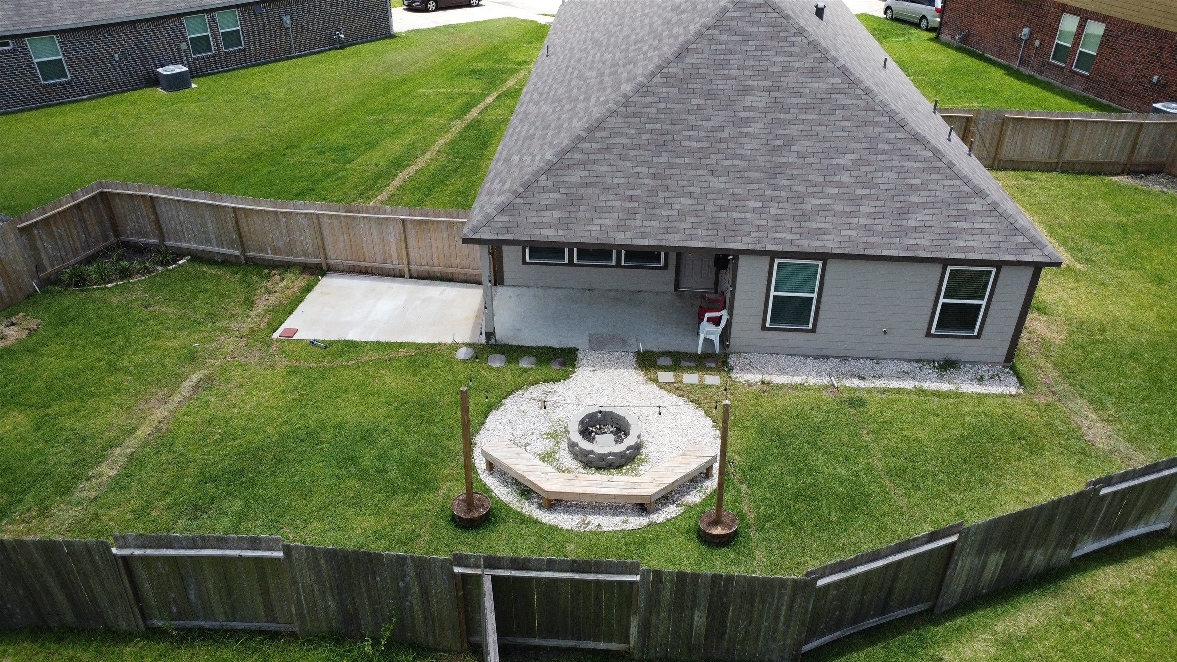 3006 Tandem Court Rosenberg, TX 77471 - Photo 31 of 33 a view of a house with a backyard and a patio