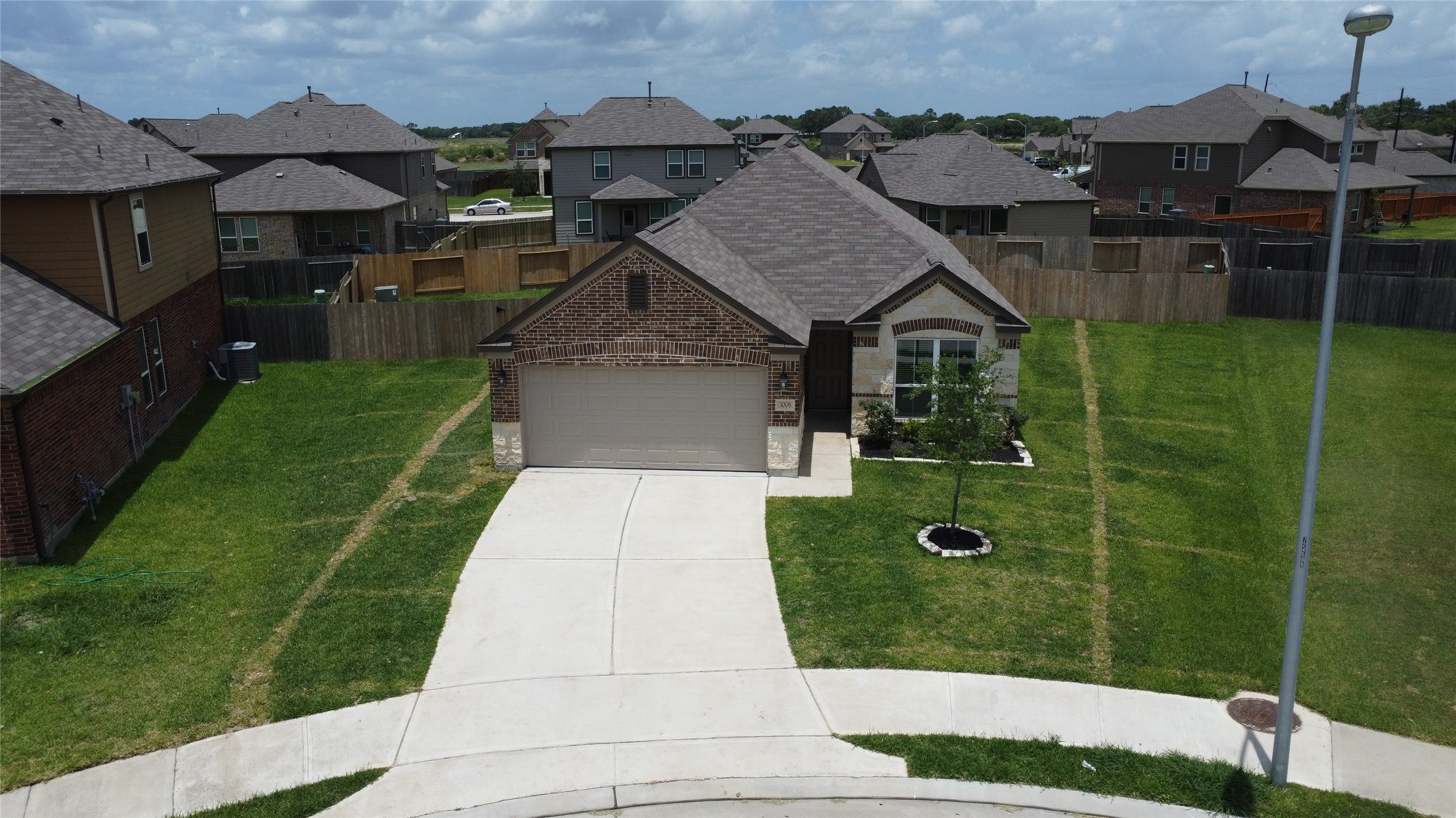 3006 Tandem Court Rosenberg, TX 77471 - Photo 32 of 33 a front view of a house with a yard
