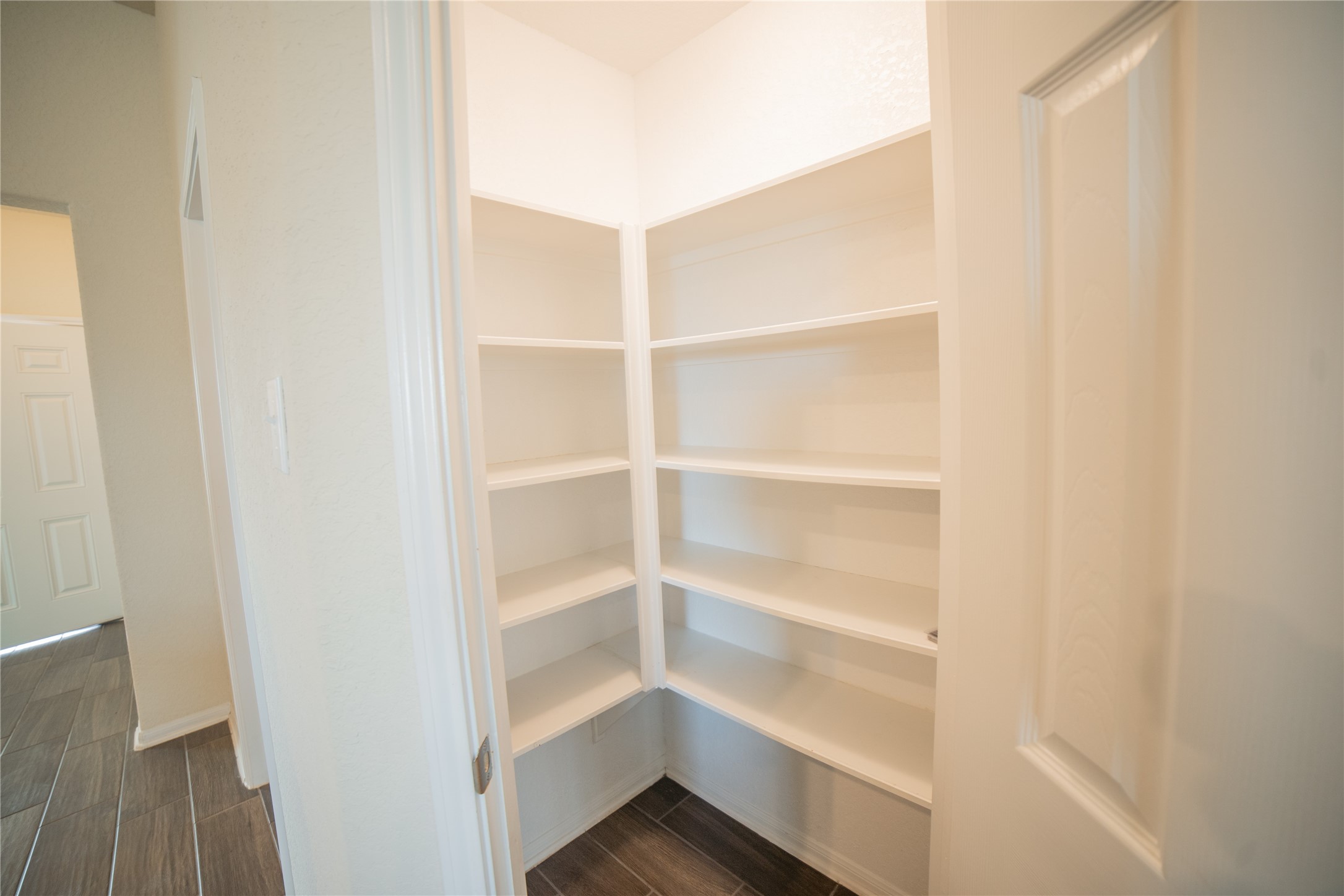 3006 Tandem Court Rosenberg, TX 77471 - Photo 10 of 33 a view of walk in closet with empty racks