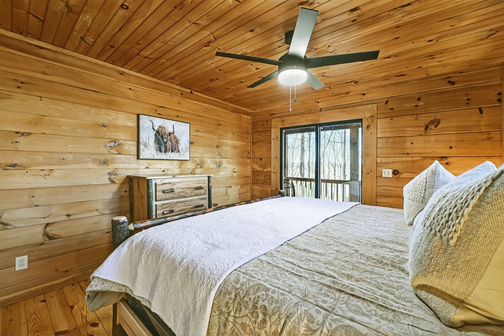 22 Running Bear Ridge Blue Ridge, GA 30513 - Photo 30 of 60 Main level bedroom with glass doors to the covered