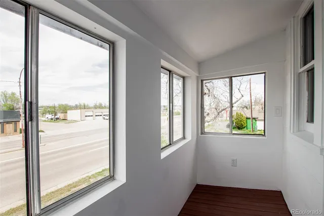 a view of an empty room and window