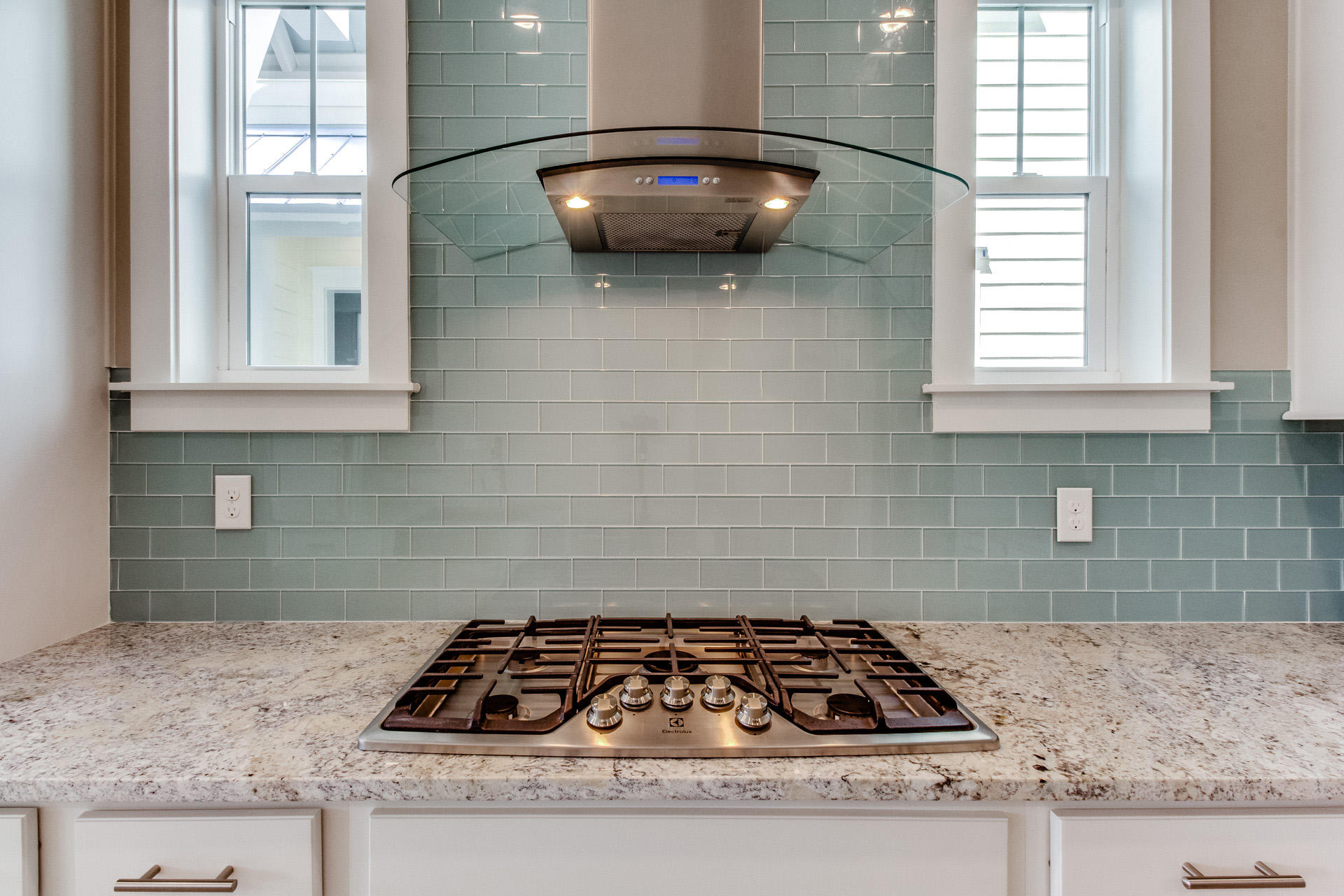 141 Pine Lands Loop Inlet Beach, Unit 519 Inlet Beach, FL 32461 - Photo 4 of 21 a kitchen with granite countertop a sink a stove and a window