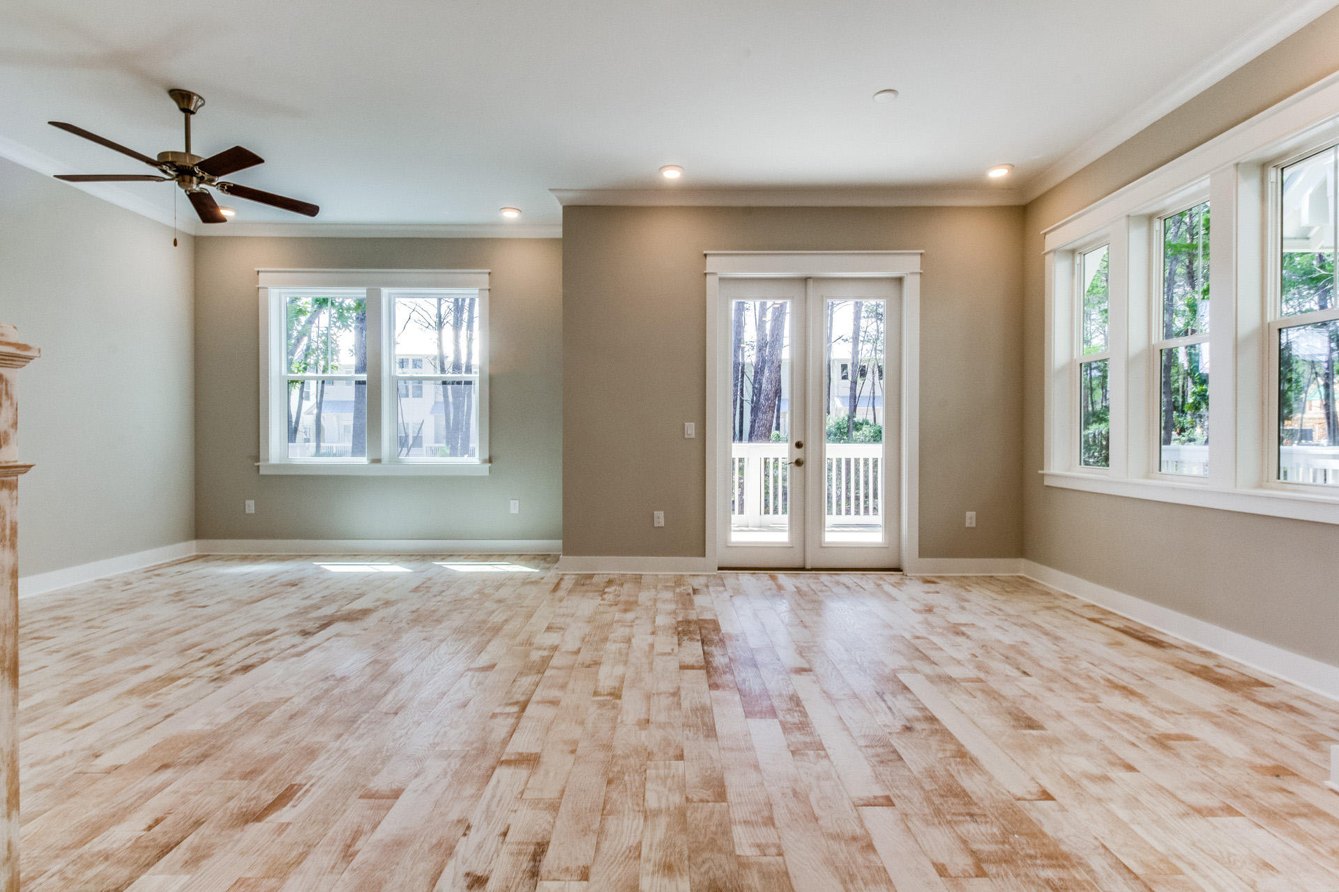 141 Pine Lands Loop Inlet Beach, Unit 519 Inlet Beach, FL 32461 - Photo 9 of 21 a view of an empty room with a window and wooden floor