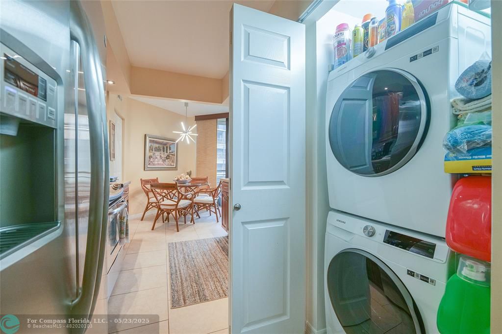 7300 Radice Court, Unit 302 Lauderhill, FL 33319 - Photo 19 of 81 a view of a living room washer and dryer