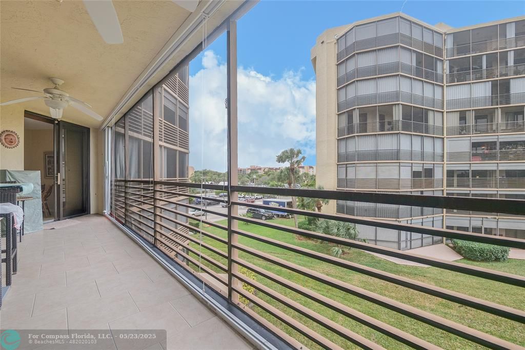 7300 Radice Court, Unit 302 Lauderhill, FL 33319 - Photo 2 of 81 a view of a building from a balcony