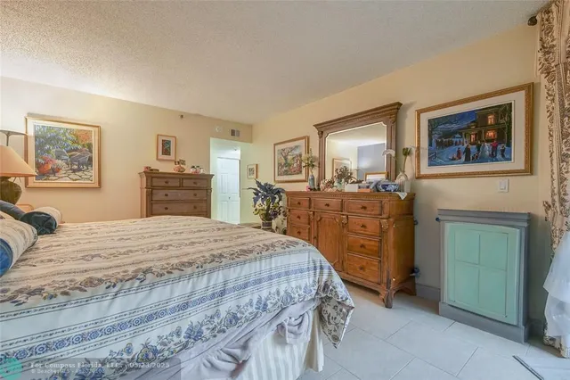 a bedroom with a bed and furniture